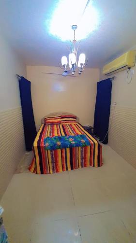 Sharjah House | Fully Furnished bedroom with shared bathroom in a villa sharjah