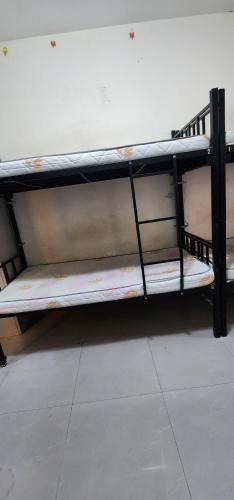 Al Khabaisi Apartment | Hall Men bed Space