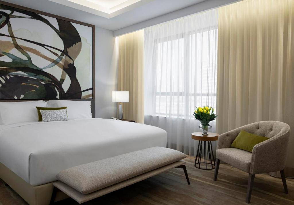 Jadaf Apartment | King Bedroom Near Spring Green Supermarket By Luxury Bookings