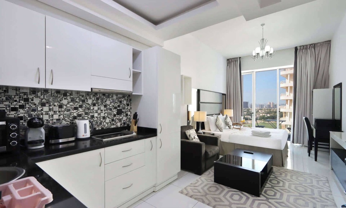 Dubai Sports City Apartment | Livbnb-Sleek Modern Studio with Balcony, Dubai Sports City