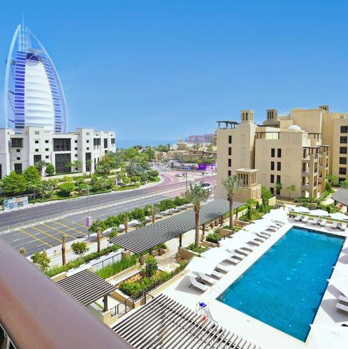 Umm Suqeim 3 Apartment | Luxury 2BR Apartment with Iconic Burj Al Arab View from the Swimming Pool