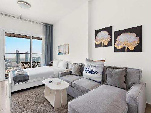 Jumeirah Village Circle Apartment | Modern Studio with Sofa Bed in JVC-