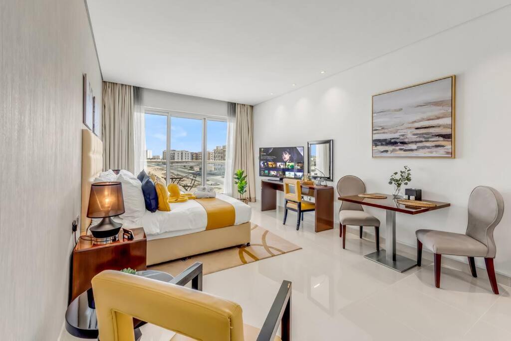 Dubai Investment Park Apartment | Waves - Stylish Studio with Balcony in Dubai South
