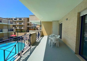 G.Bay C12 - First floor apartment with balcony overlooking the sea and swimming