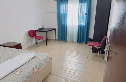 Sharjah Apartment | Big bedroom in apartment sharing washroom