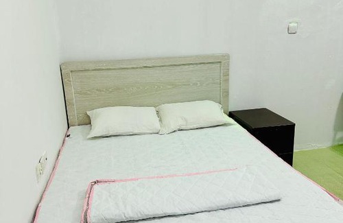 Sharjah Apartment | Big bedroom in apartment sharing washroom