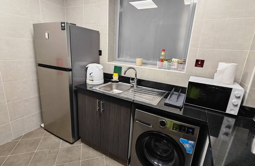 Al Satwa Apartment | Chic 1-bedroom apartment in enchanting Dubai with WiFi, fitness room