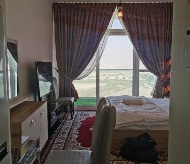 Dubai Apartment | Heaven Escape surrounded by stunning golf view High floor -Netflix-GYM-pool -perfect vacations