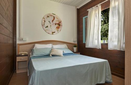 Baia Domizia House | Holiday Home Bungalow in legno by Interhome