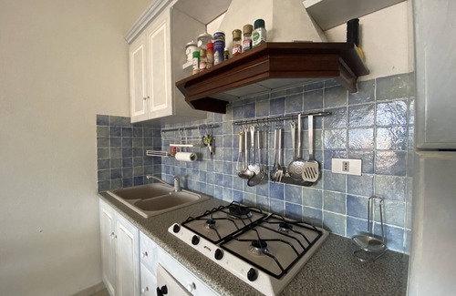 Case Peschiera-Lu Fraili House | Holiday Home 'Villetta Sofia' with Garden & Wi-Fi