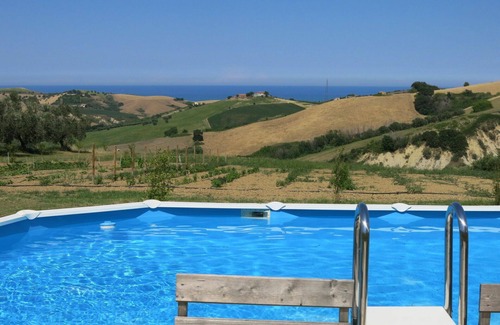 Cologna Spiaggia Villa | Lovely apartment in villa with hot tub, WIFI, pool, A/C, TV, patio, pets allowed, panoramic view