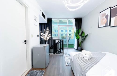 Jumeirah Village Circle Apartment | Modern Duplex JVC l Balcony Jacuzzi, Pool & Gym