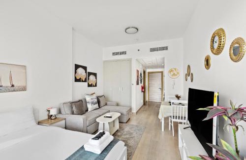 Jumeirah Village Circle Apartment | Modern Studio with Sofa Bed in JVC-
