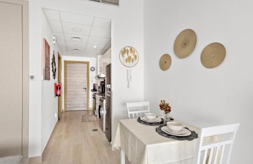 Jumeirah Village Circle Apartment | Modern Studio with Sofa Bed in JVC-