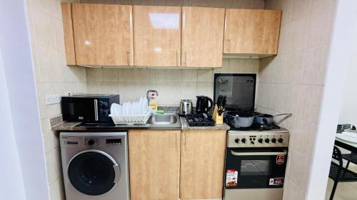 International City Apartment | N08 Luxury Furnished Apartment with balcony Near bus stop Persia cluster