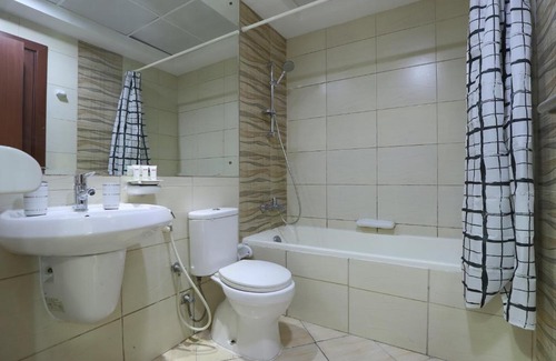 Dubai Production City Apartment | OYO Home 372 1BHK Qasr Sabah-3 IMPZ