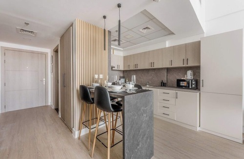 Dubai Sports City Apartment | Peaceful Studio Apartment at Frankfurt Tower in Sports City