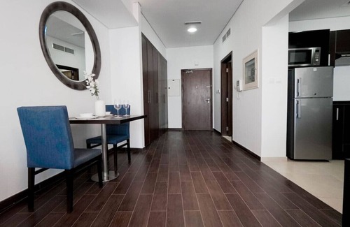 Dubai Sports City Apartment | StoneTree - The Matrix Studio Apartment in Sports City