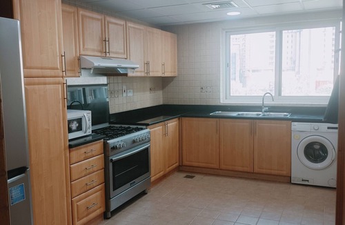 Al Muraqqabat Apartment | 2015 Deluxe 15 minutes to Burj Khalifa by Metro