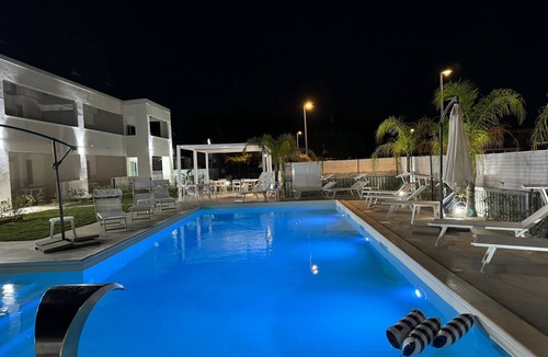 Lido Apartment | Accoglienti Appartamenti Dallo Stile Moderno ed Elegante con Vista Piscina