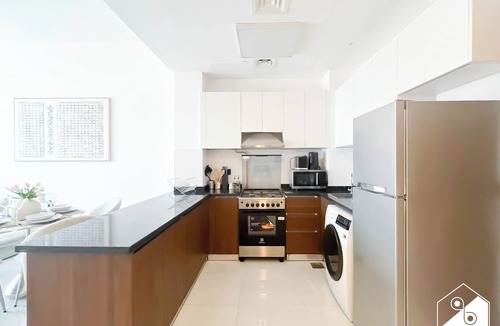 International City Apartment | Bright 2bed Family Home: Pool, Gym & Kids Play