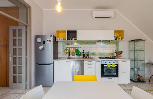 Vittorio Emanuele Apartment | Bright Rooftop Apartment