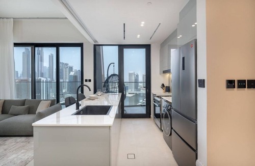 Business Bay Apartment | Canal front apartment with Burj Khalifa view