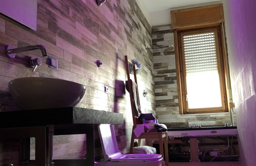 Ercolano Condo | CasaCondo@Flora: Relax in a Spacious Condo with Jacuzzi - Your Naples Getaway