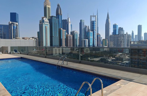 Al Satwa Apartment | Chic 1-bedroom apartment in enchanting Dubai with WiFi, fitness room