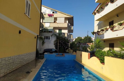 Santa Domenica Apartment | Cozy two-room apartment in Tropea for 2/4 people with swimming pool near the sea