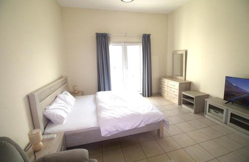 Discovery Gardens Apartment | DRUVYA HOLIDAY HOMES, Bld DG079, Street No,3 Discovery Gardens, Close to The Gardens Metro 3 minutes walkable
