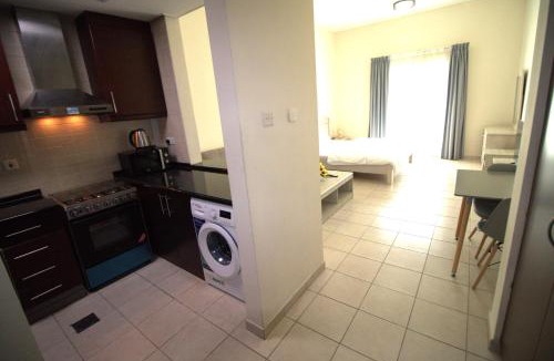 Discovery Gardens Apartment | DRUVYA HOLIDAY HOMES, Bld DG079, Street No,3 Discovery Gardens, Close to The Gardens Metro 3 minutes walkable