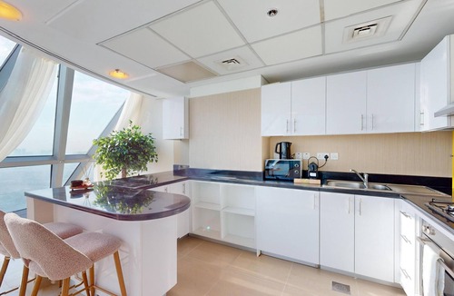 Trade Center Apartment | Duplex 2-bedroom apartment with its unparalleled retail, entertainment