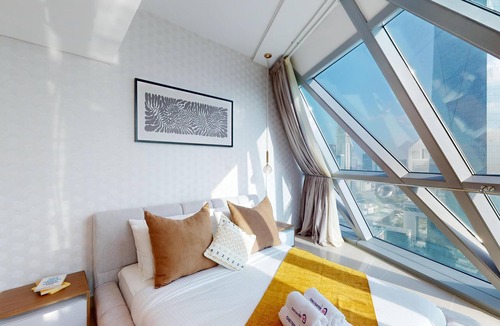 Trade Center Apartment | Duplex 2-bedroom apartment with its unparalleled retail, entertainment