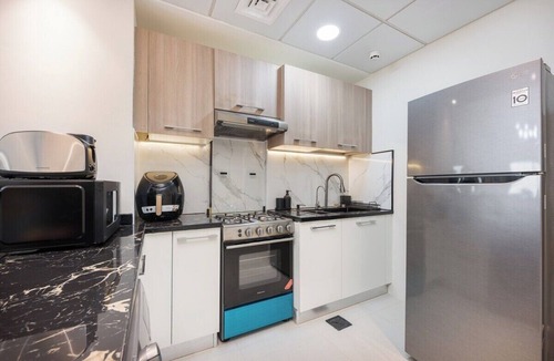 Jumeirah Village Triangle Apartment | Elegant 1-Bedroom Apartment in Jumeirah Village Triangle with Balcony Bliss