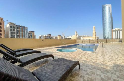 Jadaf Apartment | Elegant Studio with Canal View and Close to Metro