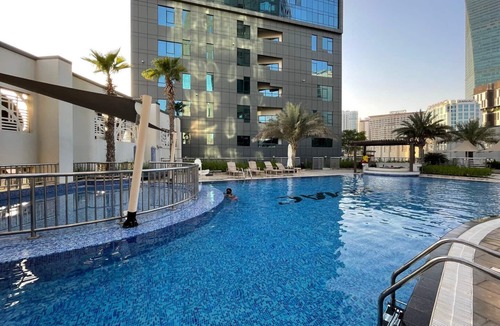Business Bay Apartment | GuestReady - Modern living at Capital Bay