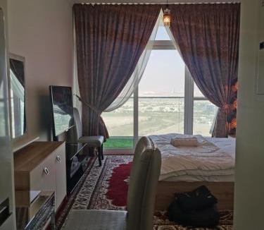 Dubai Apartment | Heaven Escape surrounded by stunning golf view High floor -Netflix-GYM-pool -perfect vacations