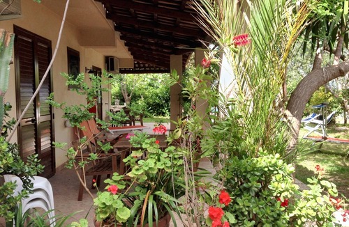 Parghelia Apartment | Homerez - Bright House in Vibo Valentia, Shared Pool