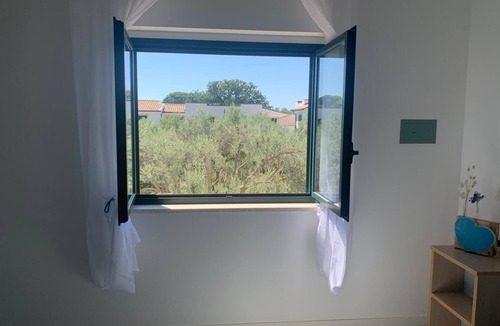 Sant'Andrea Apostolo dello Ionio House | Holiday Home 'Casa Del Sole' with Private Terrace and Air Conditioning
