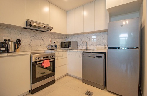 Umm Suqeim 3 Apartment | Lavish 1-BR Apartment Near Burj Al Arab @ Rahaal 2