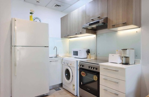 Jumeirah Village Triangle Apartment | Livbnb - Chic and Cosy Studio with Rooftop Pool, JVT
