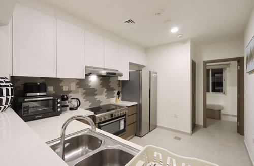 Dubai House | Livbnb- Classy 3BR+Maid's Villa with Private Patio