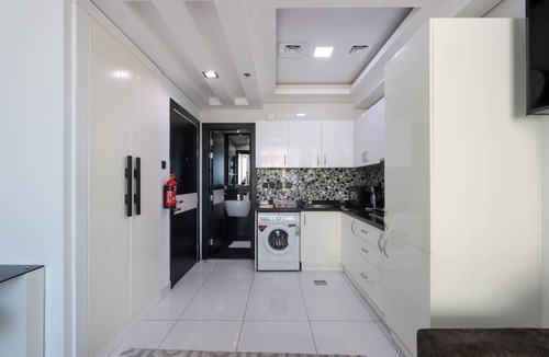 Dubai Sports City Apartment | Livbnb-Sleek Modern Studio with Balcony, Dubai Sports City