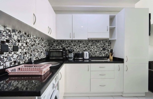 Dubai Sports City Apartment | Livbnb-Sleek Modern Studio with Balcony, Dubai Sports City