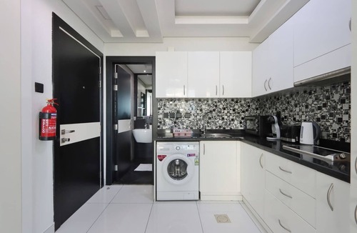 Dubai Sports City Apartment | Livbnb-Sleek Modern Studio with Balcony, Dubai Sports City