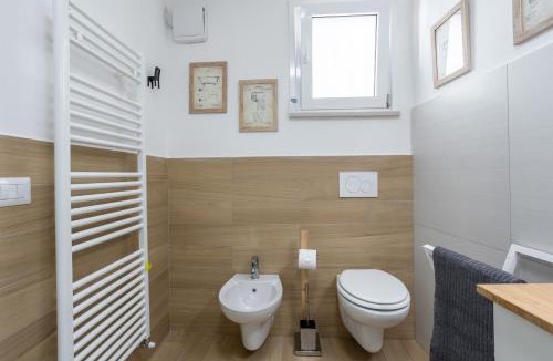 Ferro di Cavallo Apartment | MaRì Studio Flat - Posto auto e Metro - ItalyWeGo