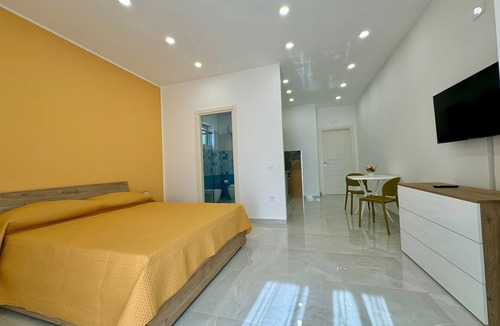 Santa Maria la Carita Apartment | Modern Loft within walking distance of Pompeii and the Sorrento Coast