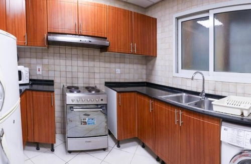 Al Mankhool House | One Bedroom Suite Near Manhattan Avenue By Luxury Bookings