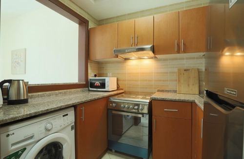 Dubai Production City Apartment | OYO Home 372 1BHK Qasr Sabah-3 IMPZ